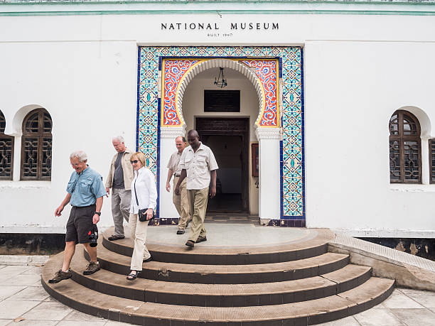 Dar es Salaam, Tanzania - Tourists go out from the National Museum in Dar es Salaam, Tanzania, on a Sunday afternoon.
