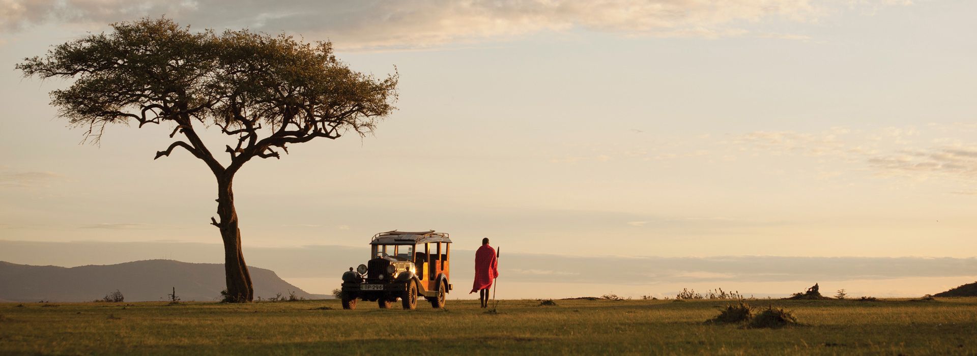  Maasai person in the Maasai Mara plains