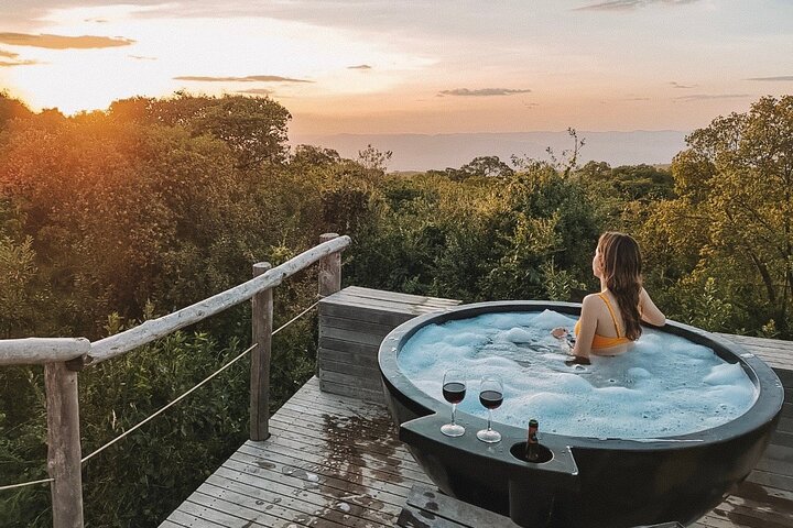 A woman on a honeymoon safari in a Serengeti lodge