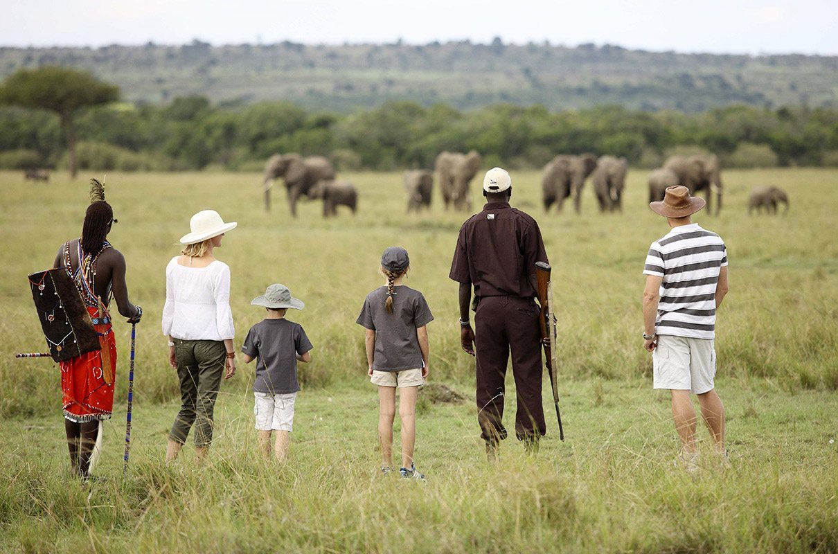 A-family-on-Walking-safaris-in-Masai-Mara A-family-on-Walking-safaris-in-Masai-Mara
