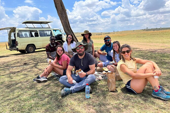Tourists in the Masai Mara plains Tourists in the Masai Mara plains