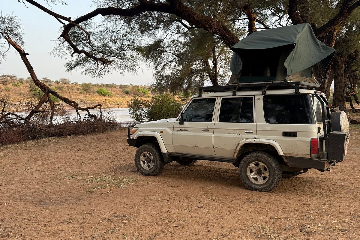 A land Cruiser with a rooftop tent for a safari in East Africa A land Cruiser with a rooftop tent for a safari in East Africa